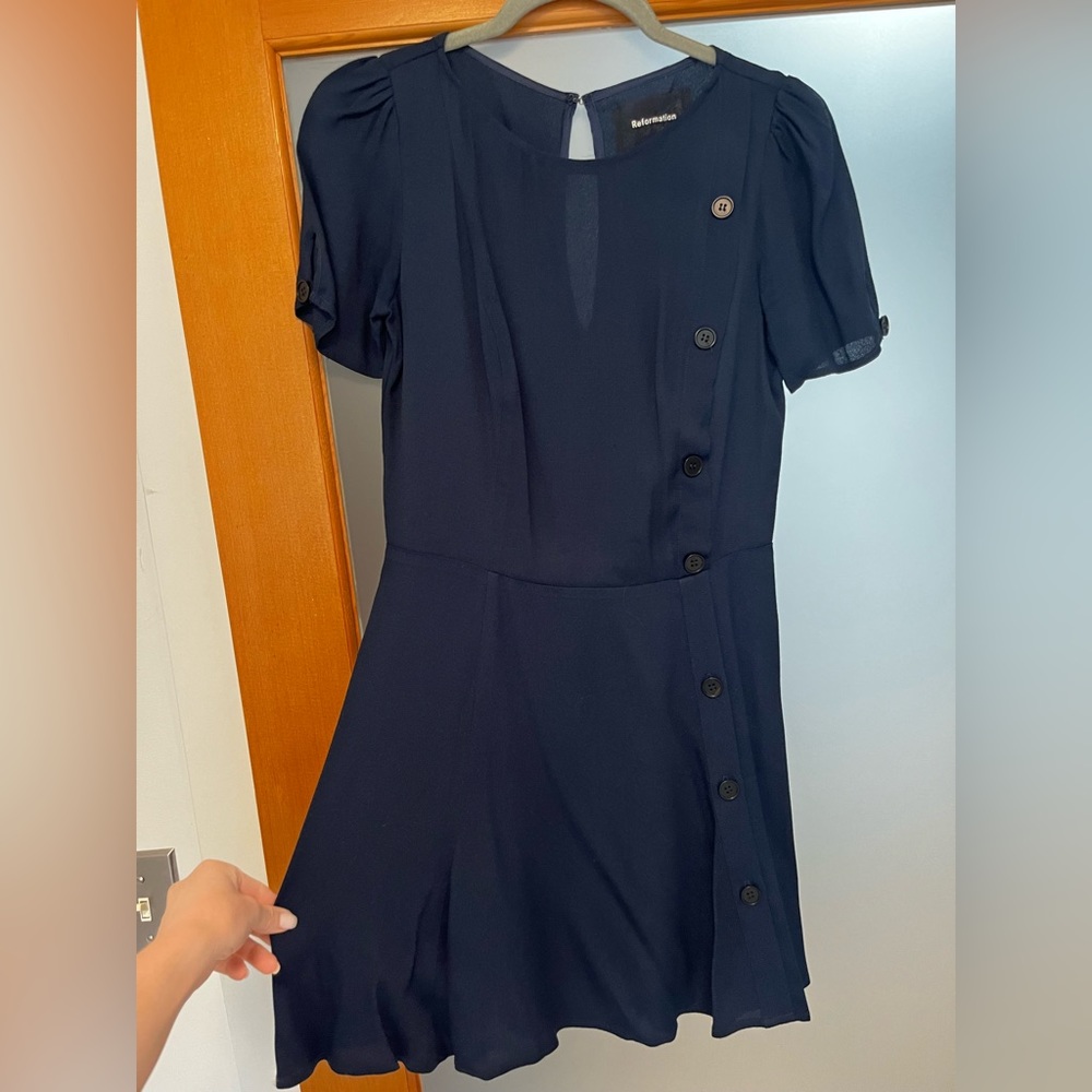 Navy button Reformation dress with a slit